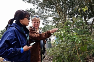 Nora passing on her knowledge. Photo by Dean Masutomi