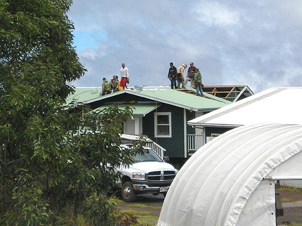 Re-roofing the volunteer cabin. Photo by Lorri Ellison